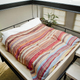 Illustration for article titled This Hanging Bed Is the Ultimate Tiny Apartment Hack